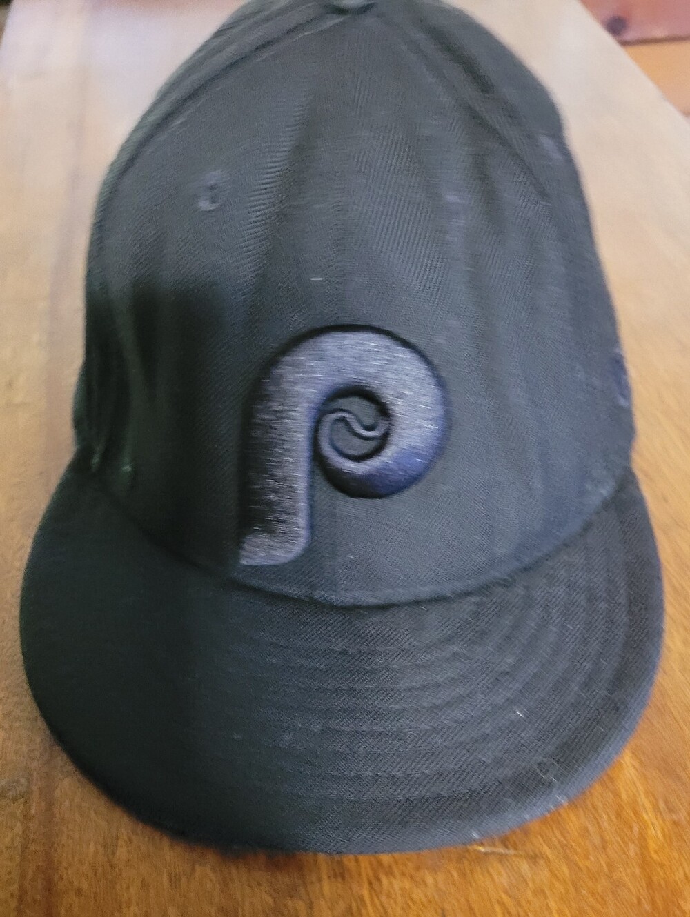 Black Baseball Cap with Raised Swirl Logo